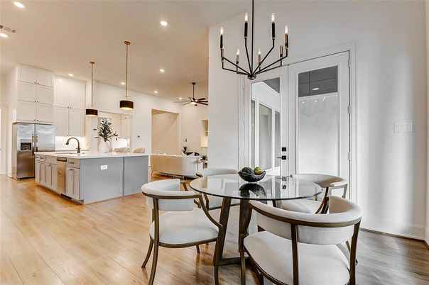 Dining room, Interior, Kitchen, Pendant Lights, Recessed Lighting, Stainless Steel Appliances, Wood Texture Flooring