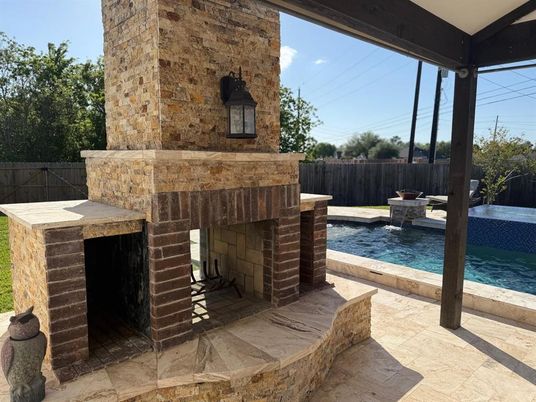 Exterior, Fireplace, Pool