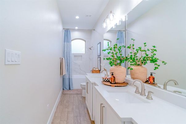 Bathroom, Dual Sink Vanities, Interior, Recessed Lighting, Wood Texture Flooring