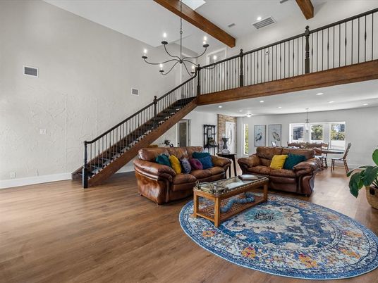 Chandelier, Dining room, Interior, Living room, Pendant Lights, Recessed Lighting, Wooden Beams, Wood Texture Flooring