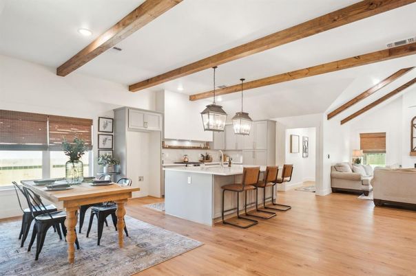 Dining room, Interior, Kitchen, Living room, Pendant Lights, Recessed Lighting, Stainless Steel Appliances, Wooden Beams, Wood Texture Flooring