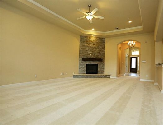 Empty room, Fireplace, Interior, Recessed Lighting, Stone Walls, Wood Texture Flooring