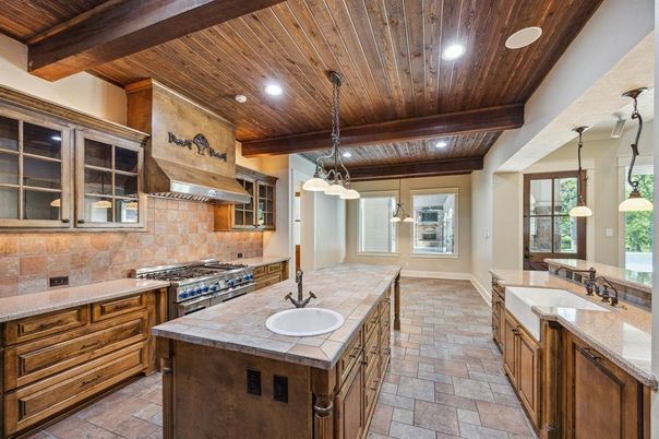 Interior, Kitchen, Pendant Lights, Recessed Lighting, Stainless Steel Appliances, Tile Countertops, Wooden Beams, Wooden Ceilings