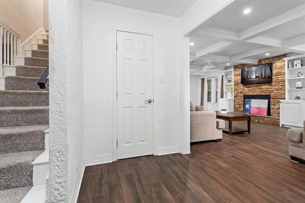 Fireplace, Interior, Recessed Lighting, Stone Walls, Wood Texture Flooring
