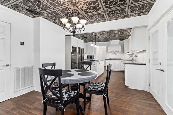 Chandelier, Dining room, Interior, Kitchen, Pendant Lights, Stainless Steel Appliances, Wood Texture Flooring