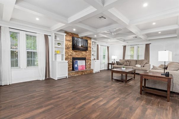 Fireplace, Interior, Living room, Recessed Lighting, Stone Walls, Wood Texture Flooring