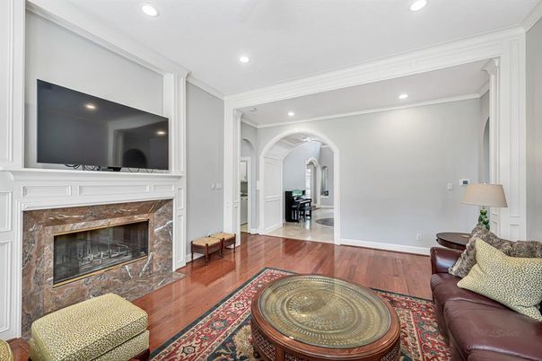 Fireplace, Interior, Living room, Recessed Lighting, Wood Texture Flooring