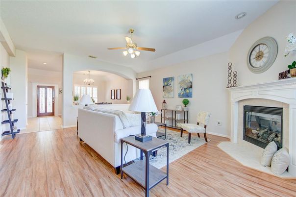 Chandelier, Fireplace, Interior, Living room, Recessed Lighting, Wood Texture Flooring