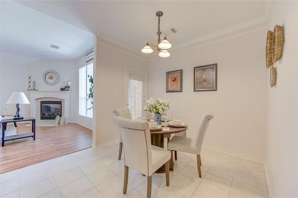 Dining room, Fireplace, Interior, Pendant Lights, Wood Texture Flooring