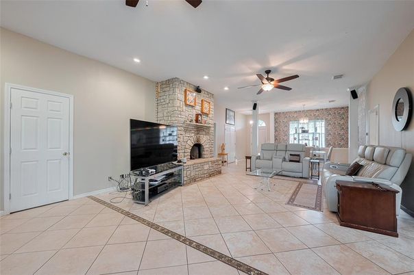 Chandelier, Dining room, Fireplace, Interior, Living room, Recessed Lighting, Stone Walls