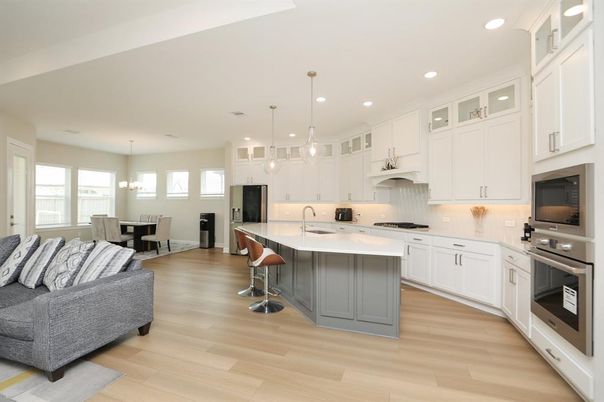 Chandelier, Dining room, Interior, Kitchen, Pendant Lights, Recessed Lighting, Stainless Steel Appliances, Wood Texture Flooring