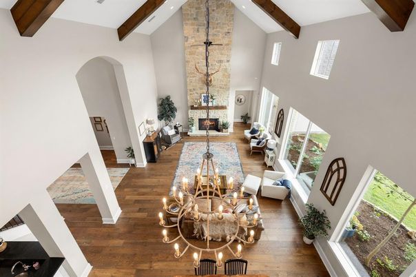 Chandelier, Fireplace, Interior, Living room, Stone Walls, Wooden Beams, Wood Texture Flooring
