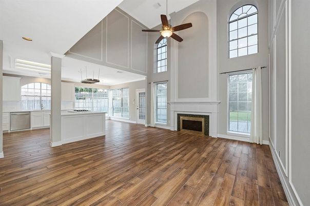 Empty room, Fireplace, Interior, Kitchen, Recessed Lighting, Wood Texture Flooring