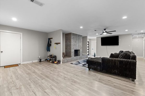 Fireplace, Interior, Living room, Recessed Lighting, Wood Texture Flooring