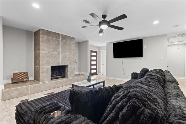 Fireplace, Interior, Living room, Recessed Lighting, Wood Texture Flooring