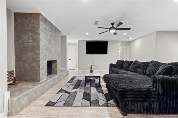 Fireplace, Interior, Living room, Recessed Lighting, Wood Texture Flooring