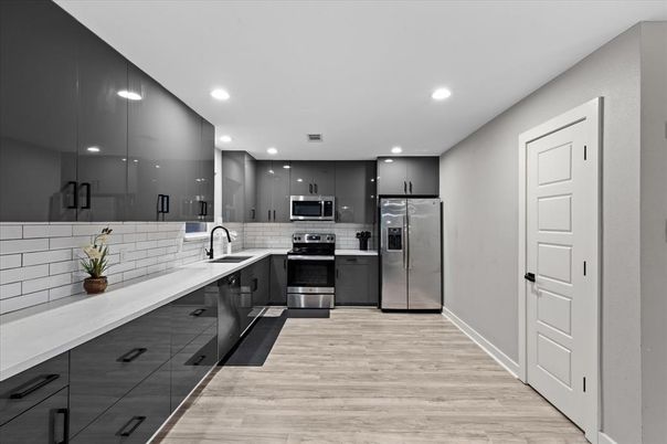 Interior, Kitchen, Recessed Lighting, Stainless Steel Appliances, Wood Texture Flooring