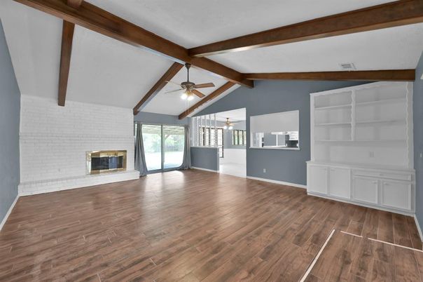 Empty room, Fireplace, Interior, Stone Walls, Wooden Beams, Wood Texture Flooring