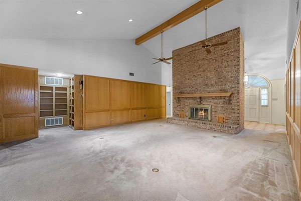 Empty room, Fireplace, Interior, Recessed Lighting, Stone Walls, Wooden Beams