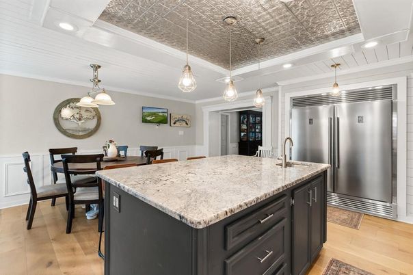 Dining room, Interior, Kitchen, Pendant Lights, Recessed Lighting, Stainless Steel Appliances, Wood Texture Flooring
