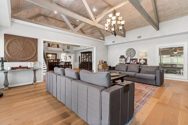 Chandelier, Dining room, Interior, Living room, Pendant Lights, Recessed Lighting, Wooden Beams, Wooden Ceilings, Wood Texture Flooring