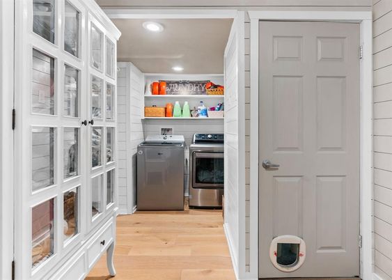 Interior, Recessed Lighting, Stainless Steel Appliances, Washer, Wood Texture Flooring