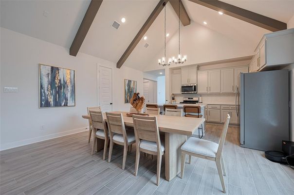 Chandelier, Dining room, Interior, Kitchen, Pendant Lights, Recessed Lighting, Stainless Steel Appliances, Wooden Beams, Wood Texture Flooring