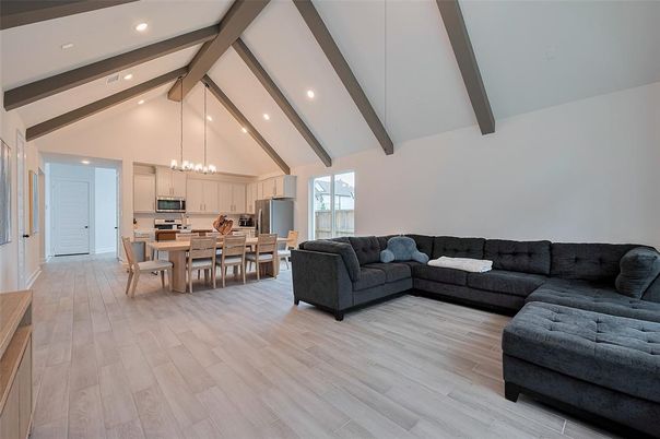 Chandelier, Dining room, Interior, Kitchen, Living room, Pendant Lights, Recessed Lighting, Stainless Steel Appliances, Wooden Beams, Wood Texture Flooring