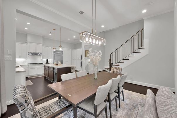 Dining room, Interior, Kitchen, Pendant Lights, Recessed Lighting, Stainless Steel Appliances, Wood Texture Flooring