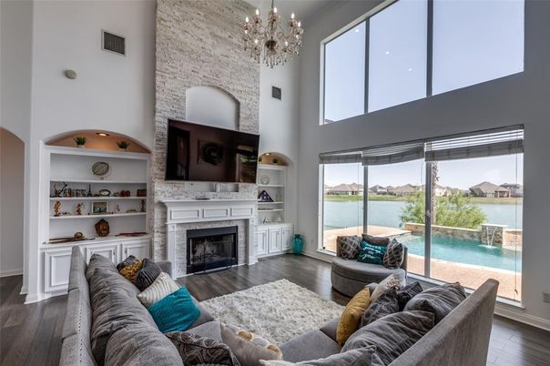 Chandelier, Fireplace, Interior, Living room, Stone Walls, Water, Wood Texture Flooring