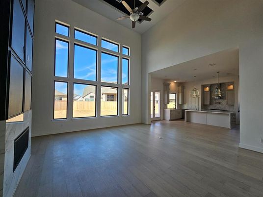 Empty room, Fireplace, Interior, Kitchen, Pendant Lights, Wood Texture Flooring