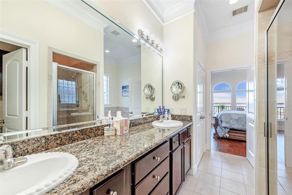 Bathroom, Bedroom, Dual Sink Vanities, Glass Shower, Interior, Recessed Lighting, Wood Texture Flooring