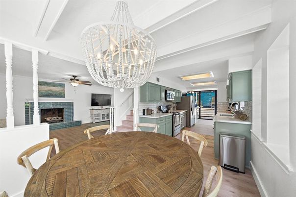 Chandelier, Dining room, Fireplace, Interior, Kitchen, Wood Texture Flooring
