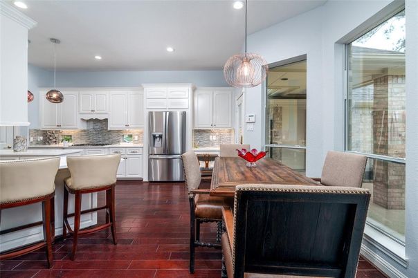 Dining room, Interior, Kitchen, Pendant Lights, Recessed Lighting, Stainless Steel Appliances, Wood Texture Flooring