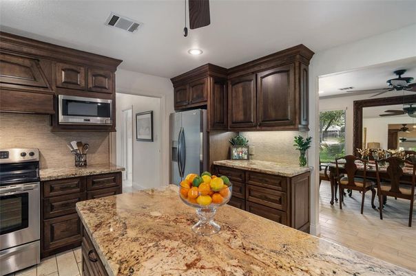 Dining room, Interior, Kitchen, Recessed Lighting, Stainless Steel Appliances, Wood Texture Flooring