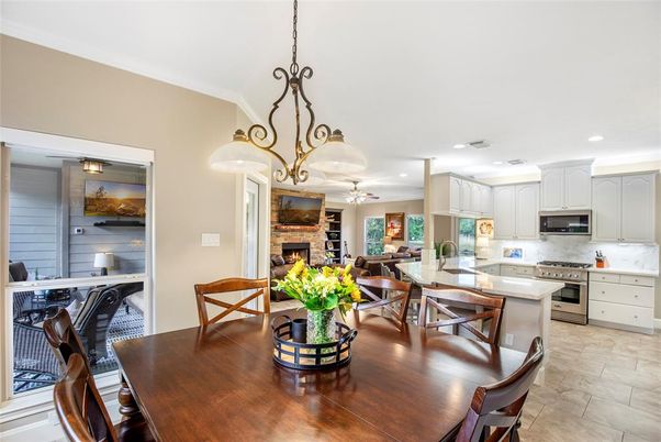 Dining room, Fireplace, Interior, Kitchen, Pendant Lights, Recessed Lighting, Stainless Steel Appliances