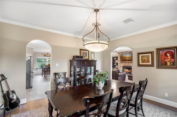 Dining room, Fireplace, Interior, Pendant Lights, Wood Texture Flooring
