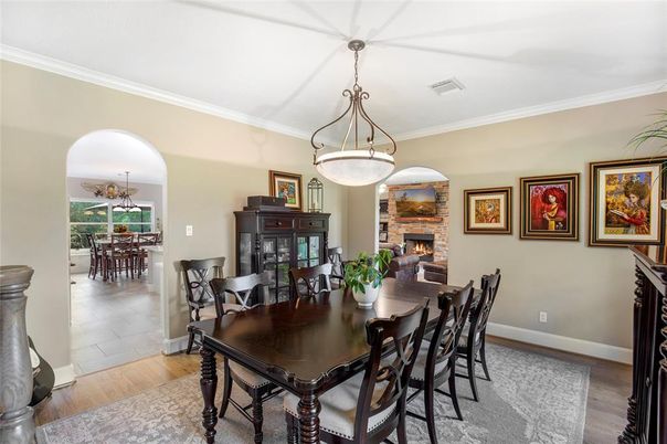 Chandelier, Dining room, Fireplace, Interior, Pendant Lights, Piano, Wood Texture Flooring