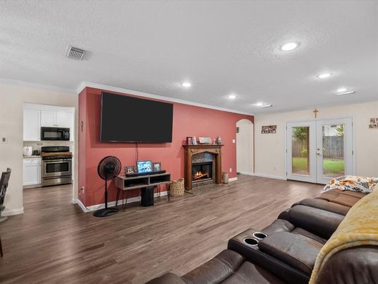 Fireplace, Interior, Kitchen, Living room, Recessed Lighting, Stainless Steel Appliances, Wood Texture Flooring