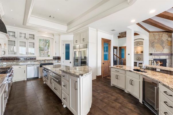Fireplace, Interior, Kitchen, Recessed Lighting, Stainless Steel Appliances, Stone Walls