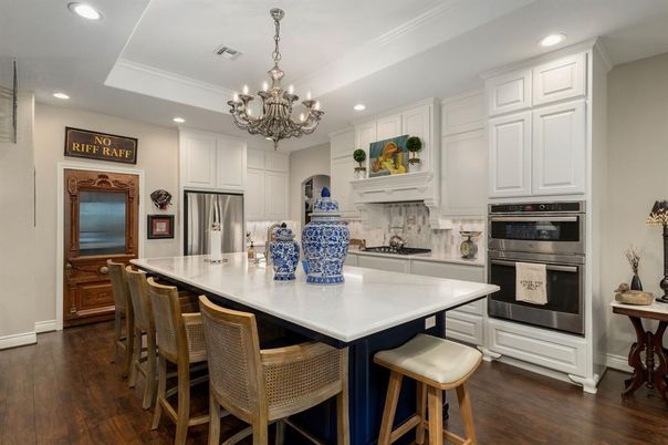 Chandelier, Dining room, Interior, Kitchen, Recessed Lighting, Stainless Steel Appliances, Wood Texture Flooring