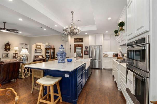 Chandelier, Interior, Kitchen, Living room, Recessed Lighting, Stainless Steel Appliances, Wood Texture Flooring
