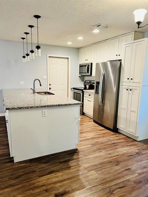 Interior, Kitchen, Pendant Lights, Recessed Lighting, Stainless Steel Appliances, Wood Texture Flooring