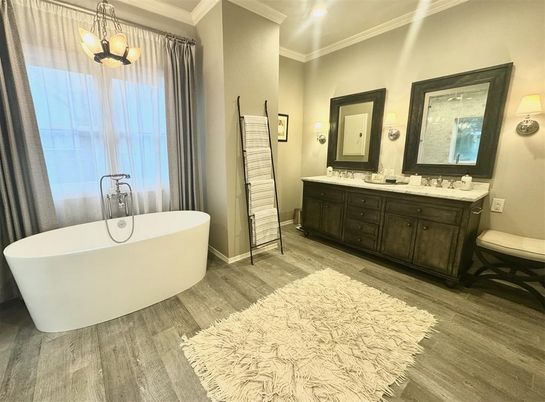Bathroom, Dual Sink Vanities, Free Standing Baths, Interior, Pendant Lights, Recessed Lighting, Wood Texture Flooring