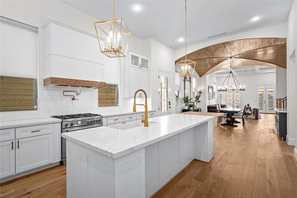 Chandelier, Dining room, Interior, Kitchen, Pendant Lights, Recessed Lighting, Stainless Steel Appliances, Wood Texture Flooring