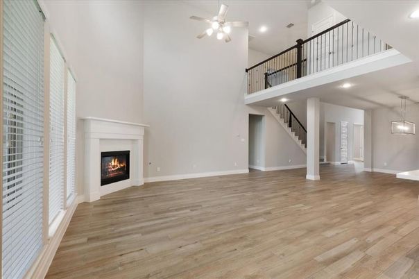 Fireplace, Interior, Pendant Lights, Recessed Lighting, Wood Texture Flooring