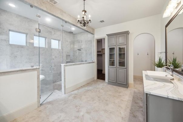 Bathroom, Chandelier, Dual Sink Vanities, Glass Shower, Interior, Marble, Marble Walls, Recessed Lighting