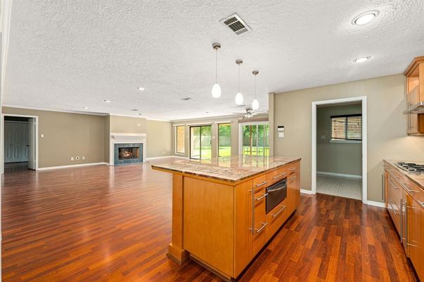 Fireplace, Interior, Kitchen, Pendant Lights, Recessed Lighting, Wood Texture Flooring
