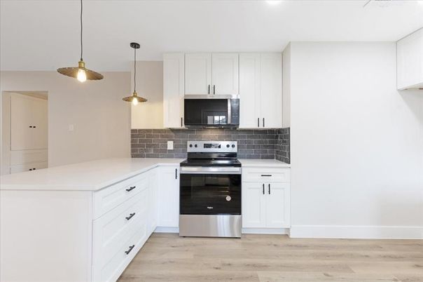 Interior, Kitchen, Pendant Lights, Stainless Steel Appliances, Wood Texture Flooring