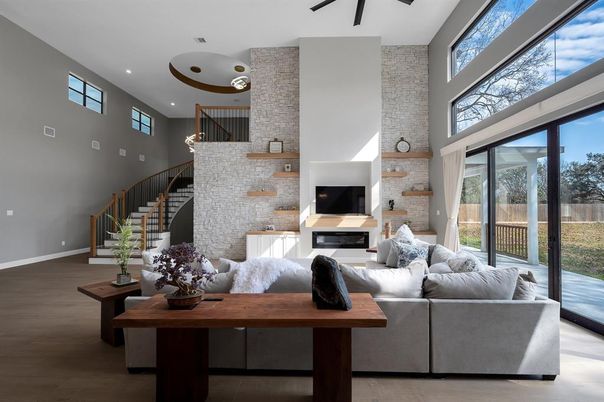 Fireplace, Interior, Living room, Recessed Lighting, Stone Walls, Wood Texture Flooring